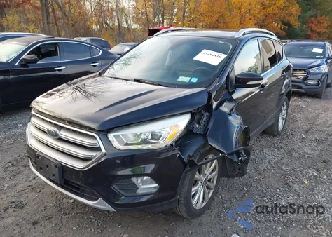 2017 Ford Escape Titanium z USA, uszkodzony, nr VIN 1FMCU9JD2HUD71023